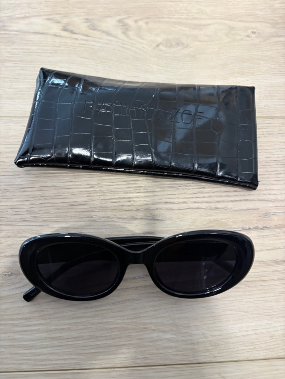 Rachel Zoe Black Oval Sunglasses with Croc-Embossed Case
